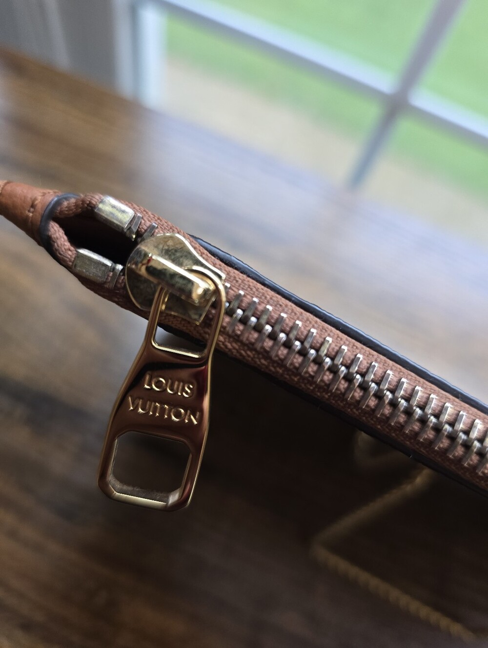 Louis Vuitton Neverfull Pochette Giant Monogram Empreinte Leather in Brown - Picture 4 of 8